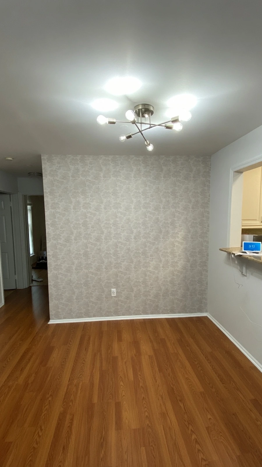 neutral grey wallpaper in a Fairfield, CT living room